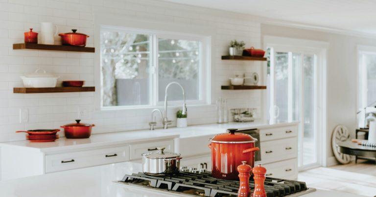Cabinet Painting Vs. Refinishing Which Is Best For Your Jacksonville Kitchen